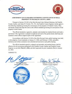 Official document titled Amendment of Standards Governing Conveyances of Real Property in Franklin County, Ohio, signed and stamped by county officials, with seals and logos at the top and bottom. Text details legal standards changes.