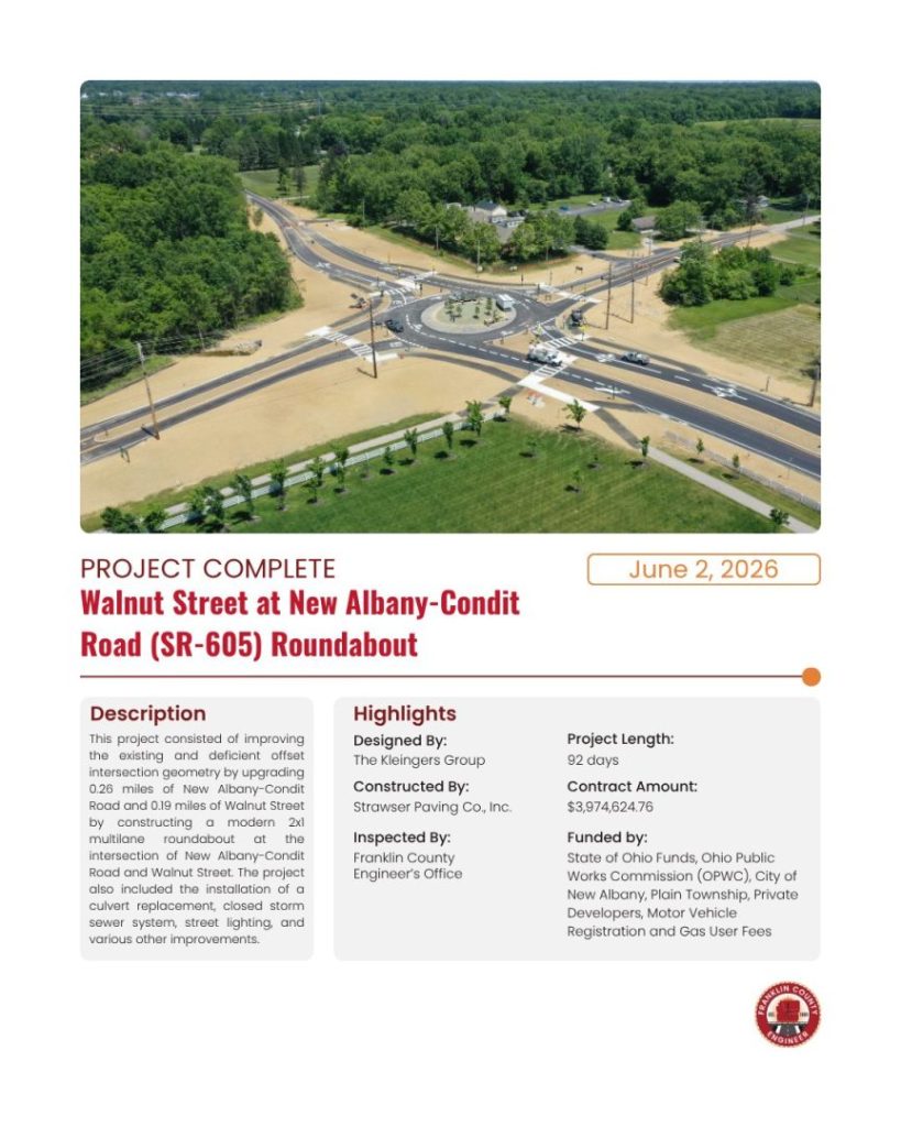 Aerial view of a completed multi-lane roundabout with crosswalks, landscaping, and surrounding roads. Project details and timelines are displayed below the image, with a red “PROJECT COMPLETE” label and Franklin County Engineers Office seal.